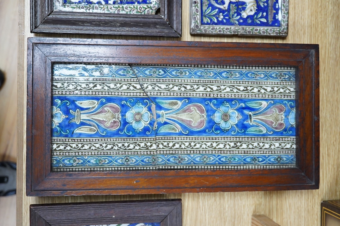 Four 18th/19th century Persian tiles, two depicting horses and riders and abstract flowers, three framed, largest 40 x 21cm